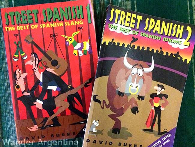 A picture of the books Street Spanish, The Best of Spanish Street Slang volumes one and two 